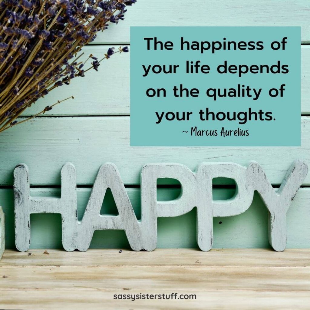 shades of teal background with a quote about happiness