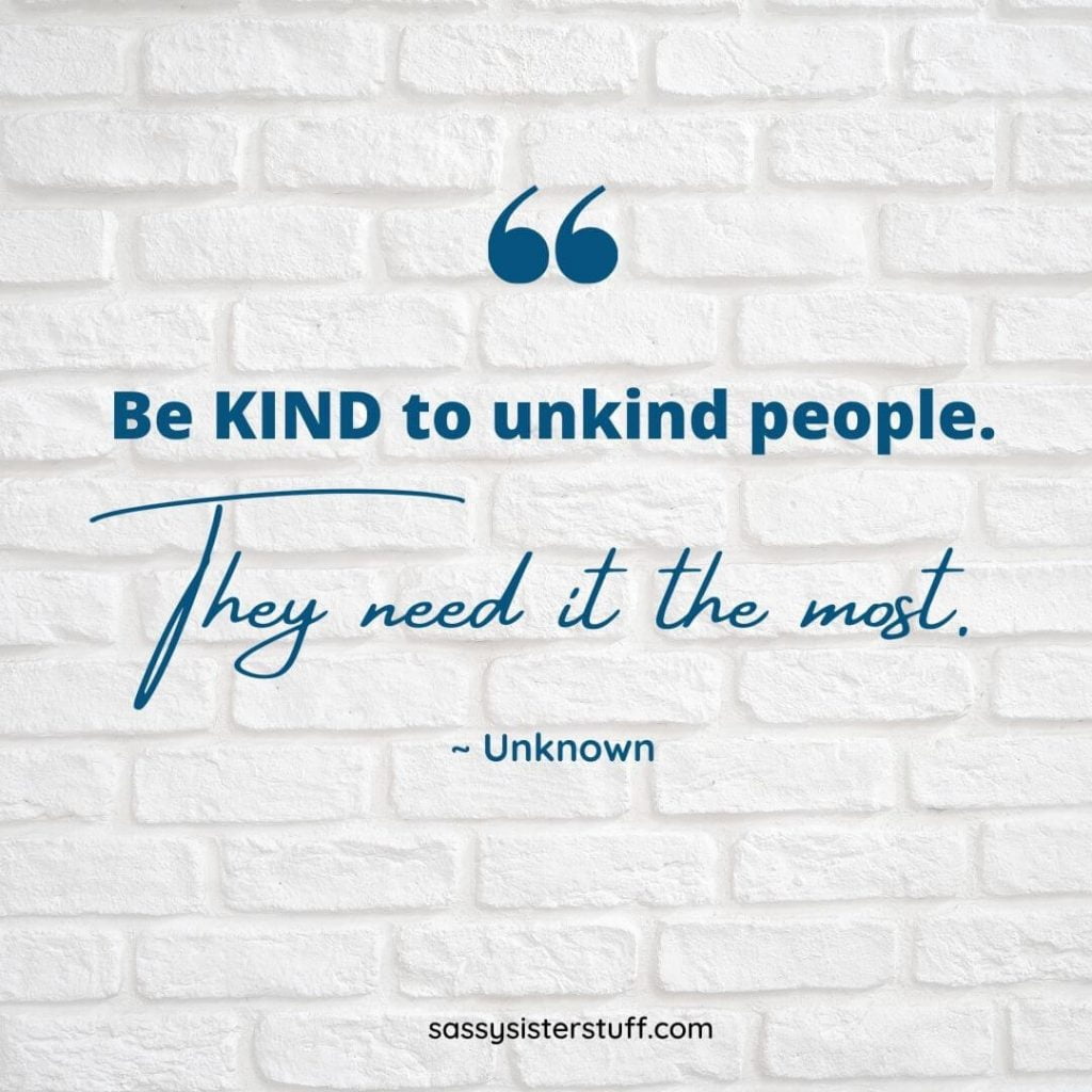 white brick background with a kindness quote