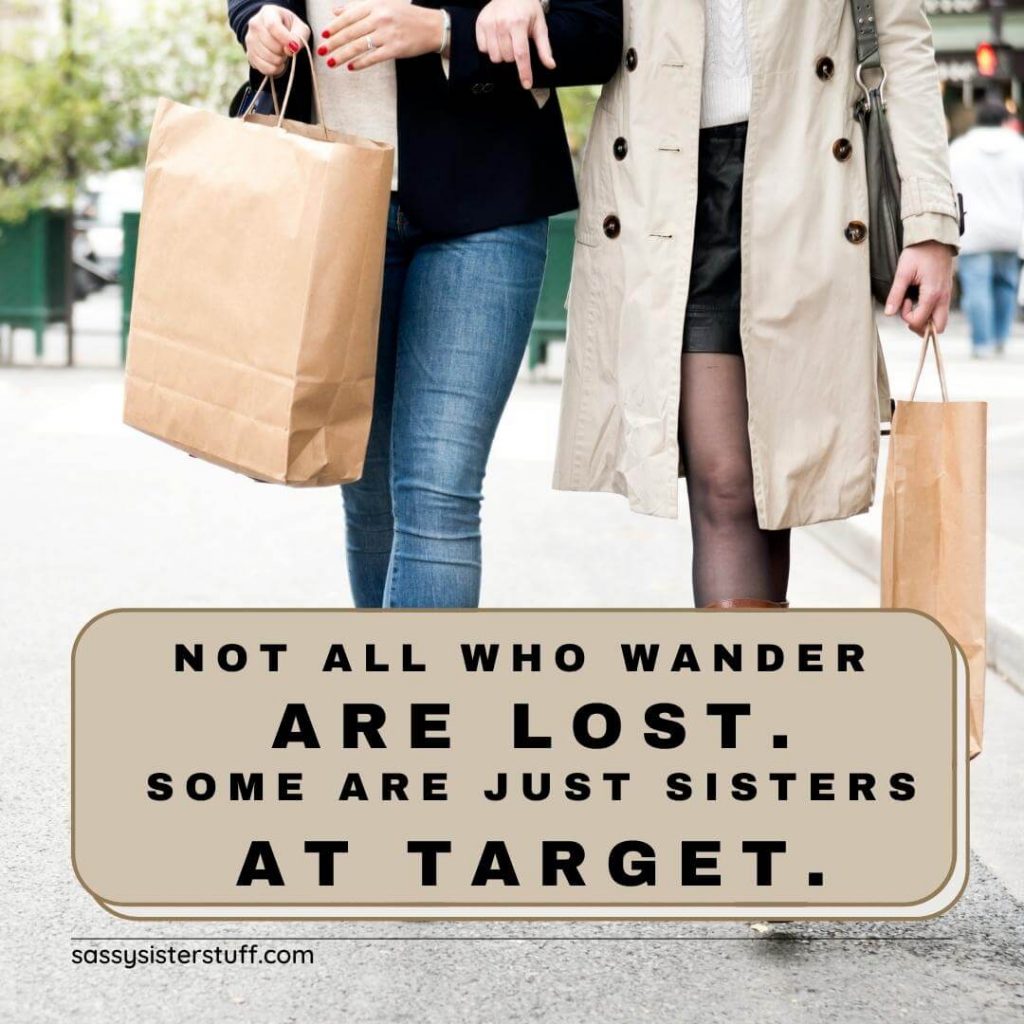 two women walking down the street with shopping bags and a quote about sisters shopping