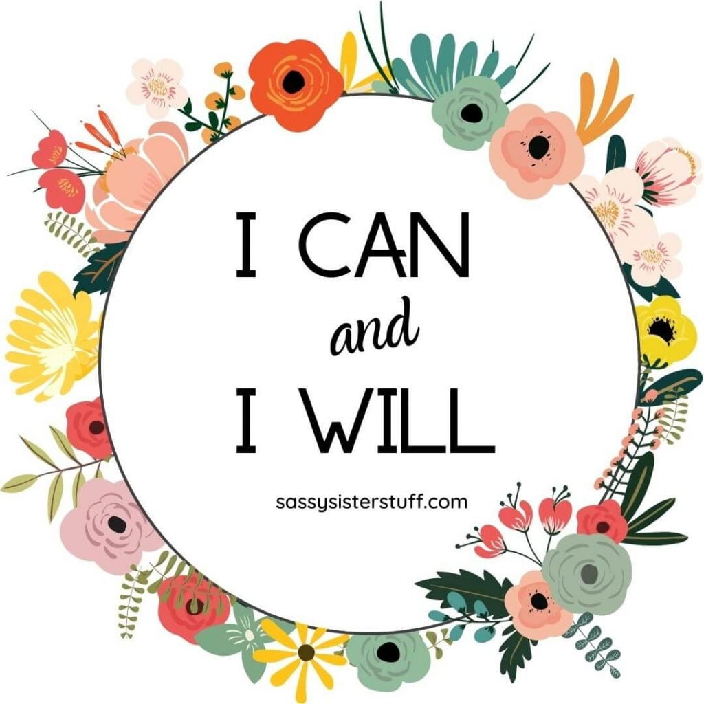 floral ring of flowers in tones of green yellow and orange with an empowerment quote in the center