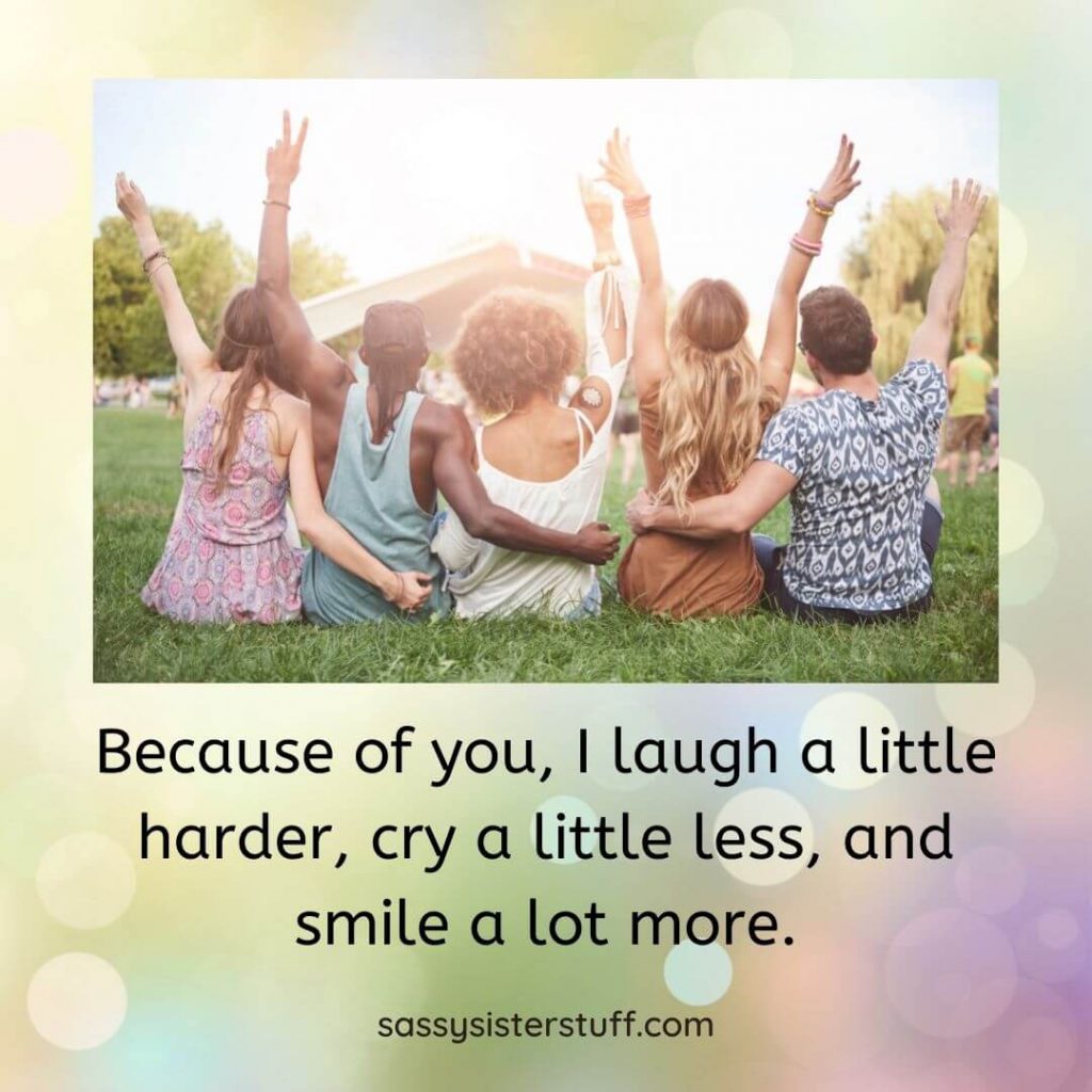 five friends sit on the ground with arms wrapped around each other and a quote about friends