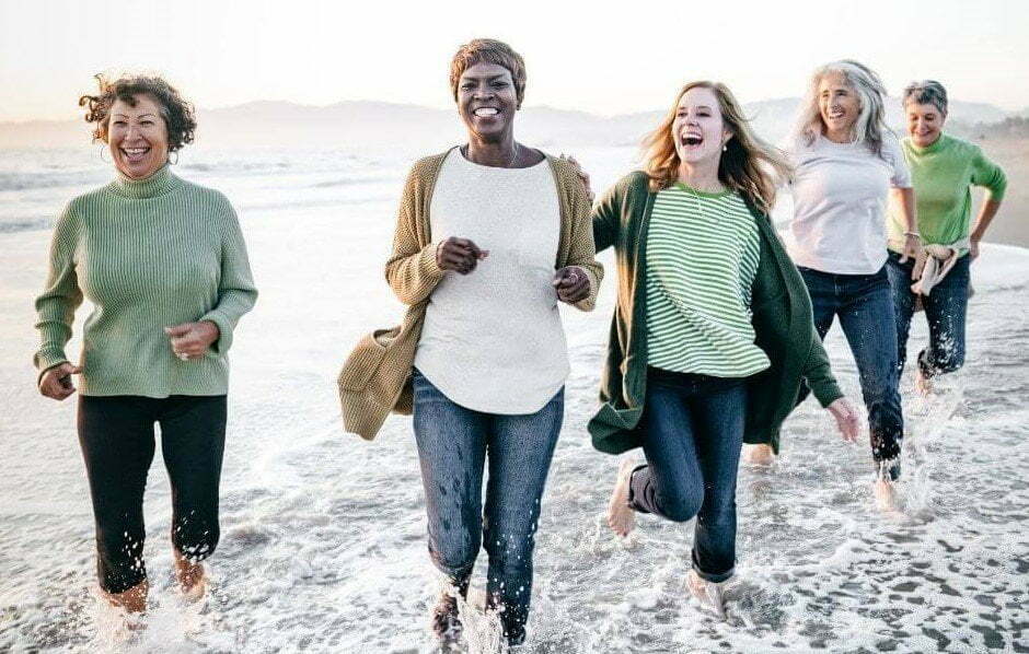 Sassy Sister Stuff Home Page image of happy ladies running along the beach