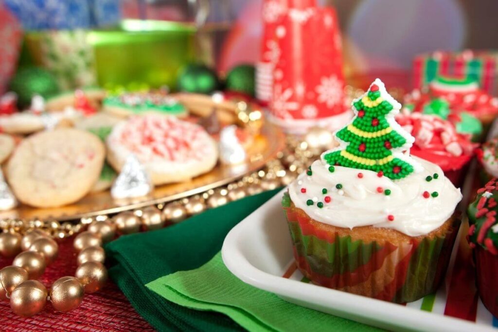 how to get in the christmas spirit with holiday cookies and cupcakes in red green and white colors