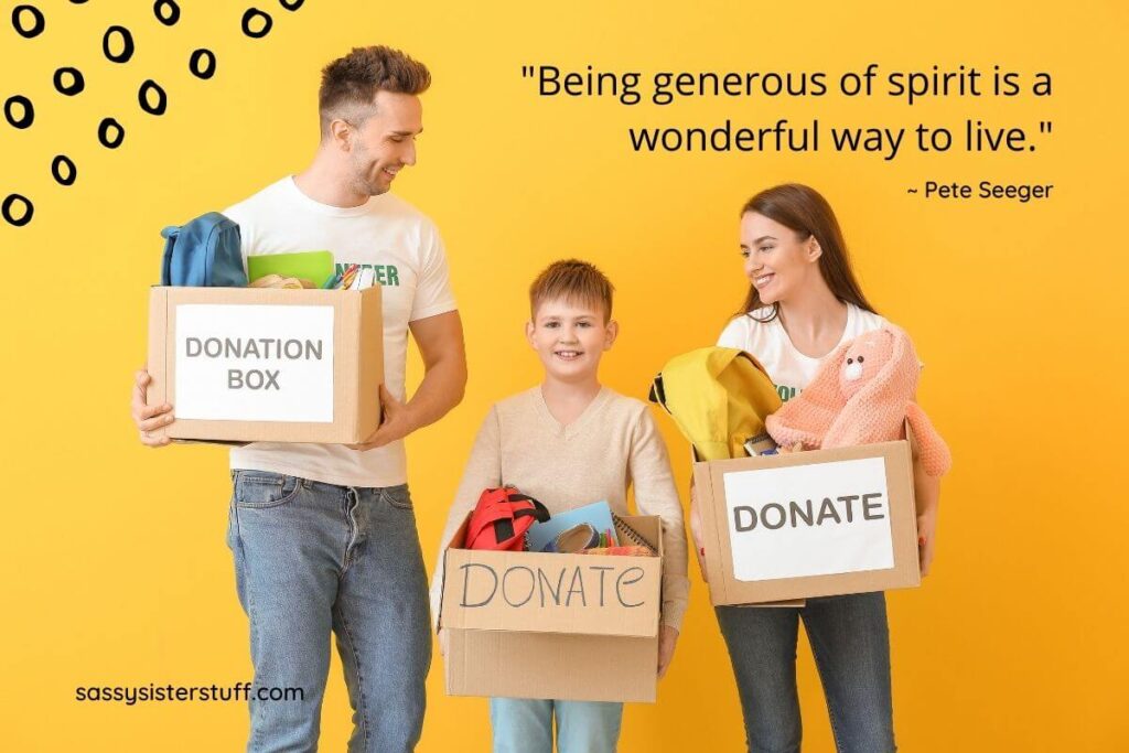 a happy and casually dressed dad mom and son carry boxes of donations with a quote about being generous