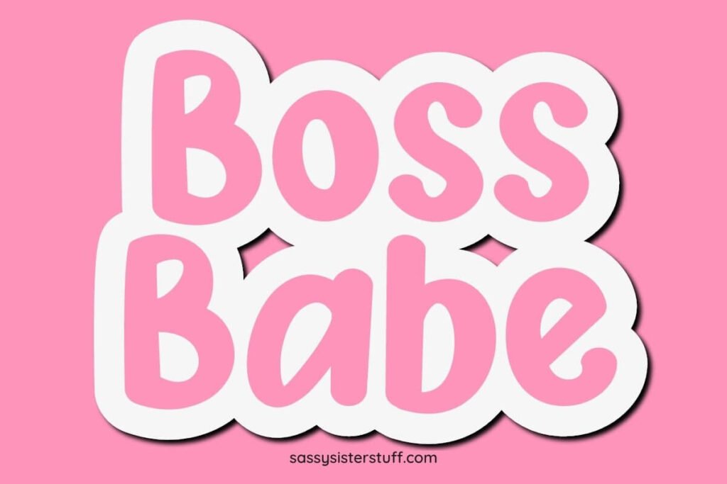 pink and white sign that says boss babe