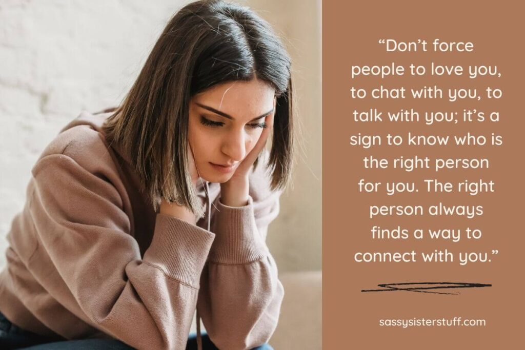 a young woman sitting with her face resting in the palms of her hands as she reflects about a quote advising never force anyone to talk to you