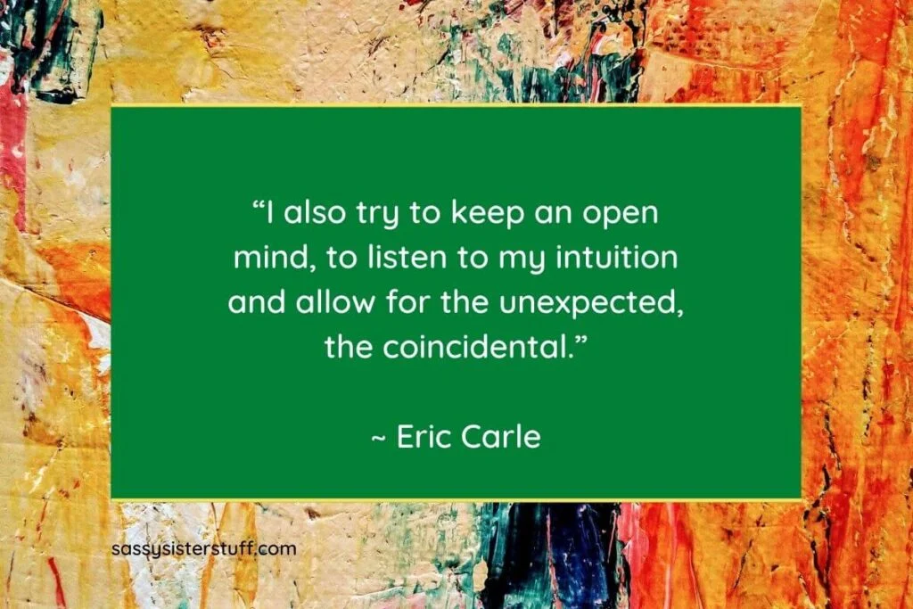 orange yellow black green and red collage of paint strokes on a textured surface with one of many great Eric Carle Inspirational Quotes written in the center on a green overlay