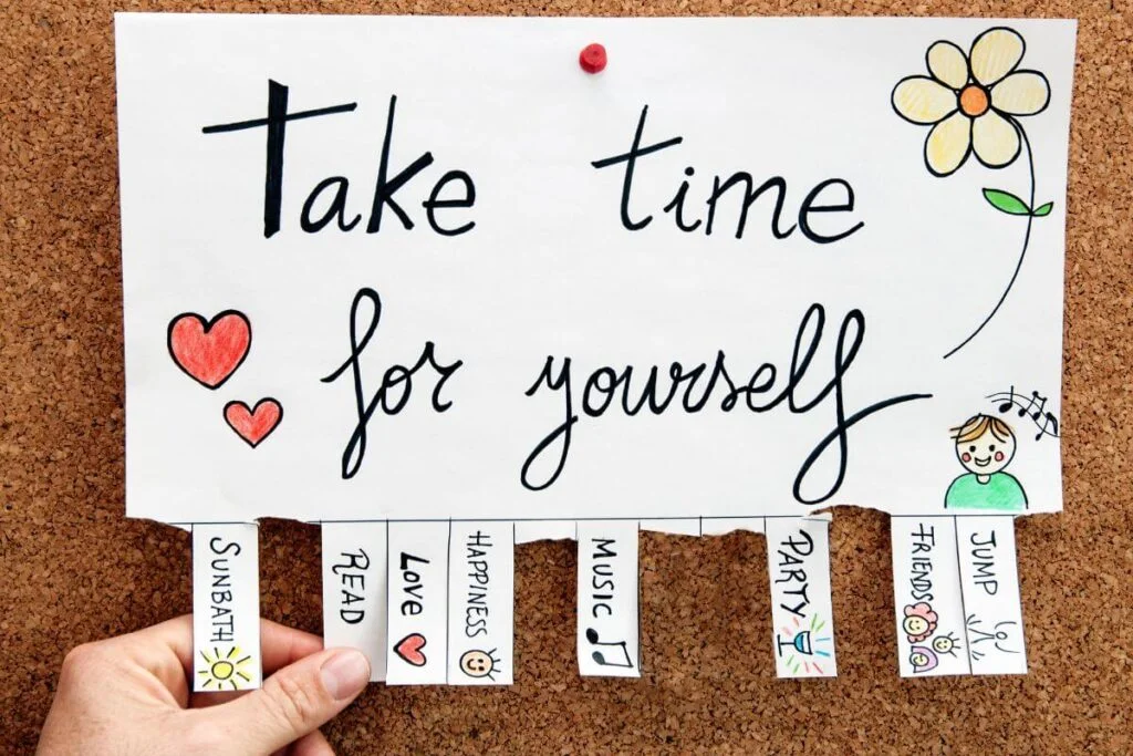 a sign that says take time for yourself on a bulletin board