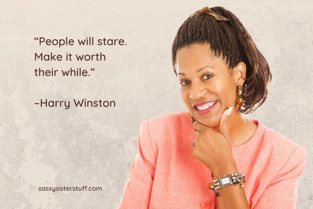 an African American business woman smiles confidently at the camera
