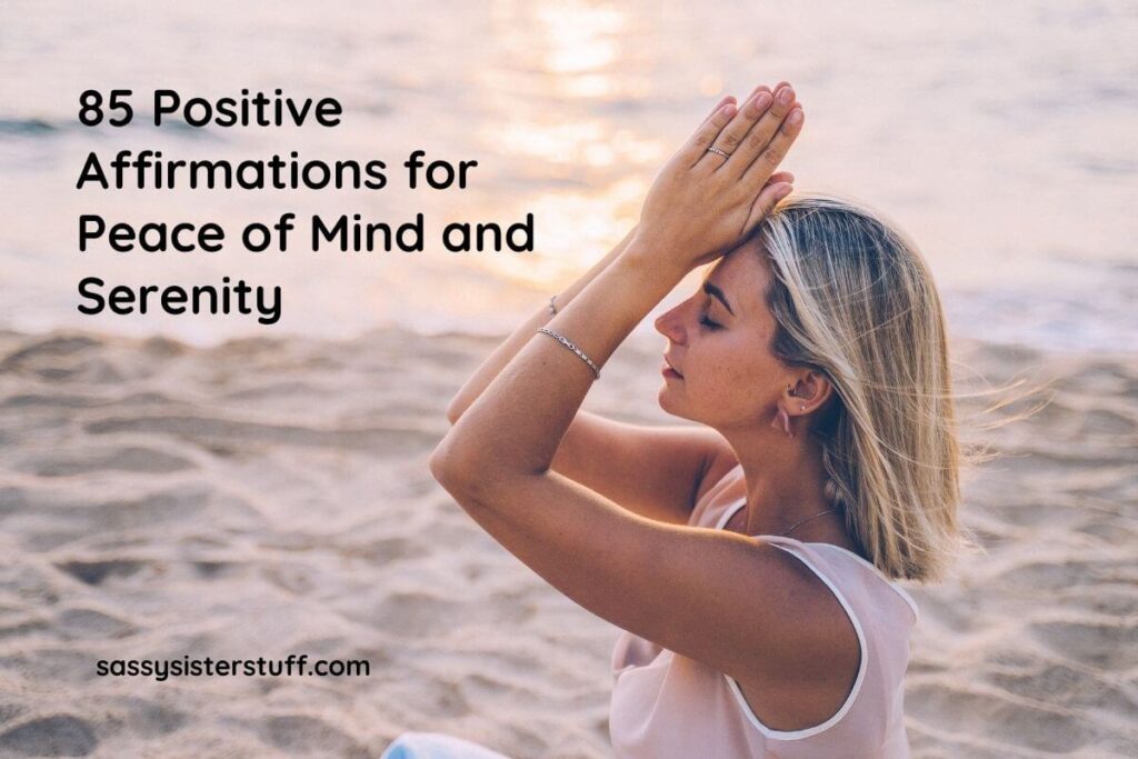 a woman meditates on a beach for peace of mind