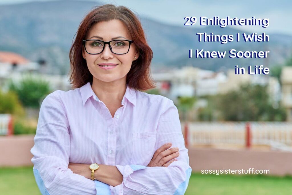 a middle-aged woman smiles directly at the camera next to the words "29 enlightening things I wish I knew sooner in life"