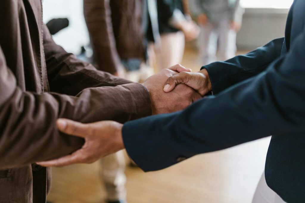 Close-up_of_two_businesspeople_shaking_hands,_symbolizing_agreement_and_partnership..RDNE_Stock_project