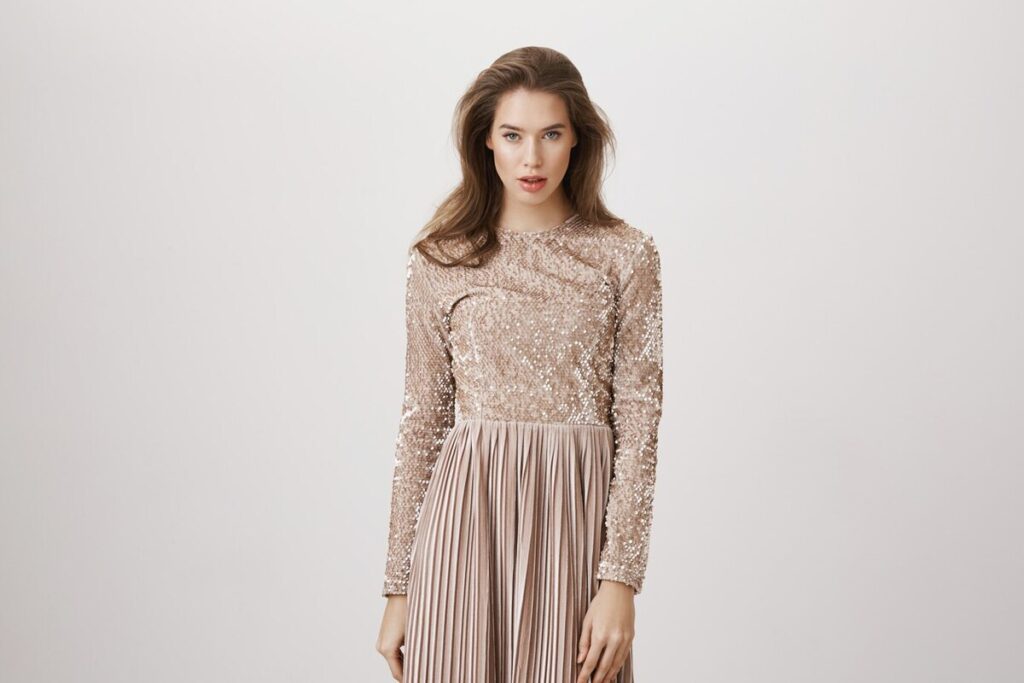 Gorgeous sassy woman in stylish evening dress