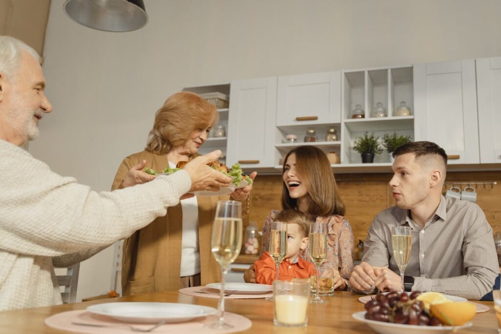 Grandparents laughing with grandparents
