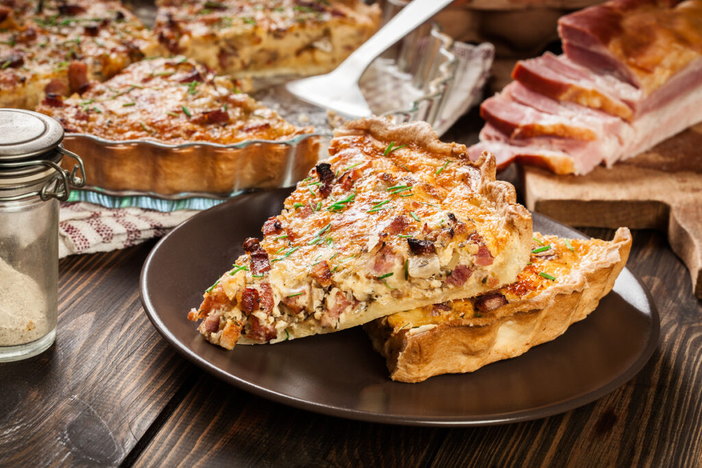 Pieces of quiche lorraine with bacon and cheese. French cuisine