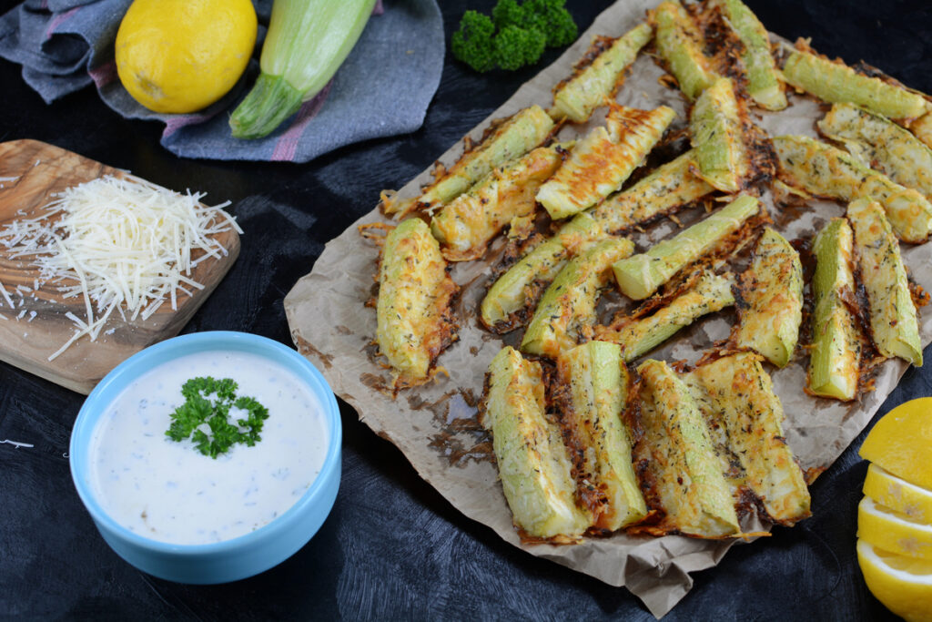 Keto Diet Zucchini Fries on background, close up
