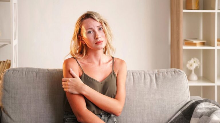 upset woman on couch