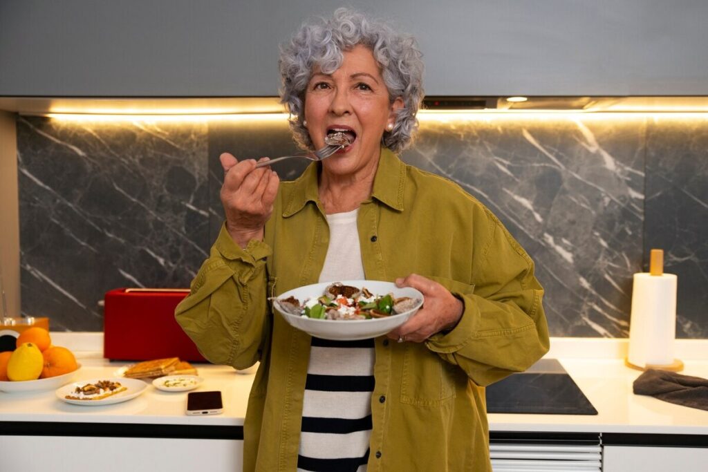 Senior woman enjoying a homemade figs dish
