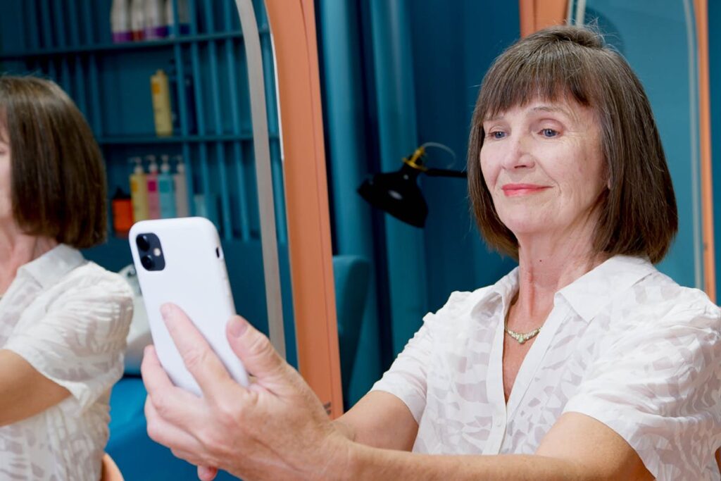 Elderly Woman Taking a Selfie