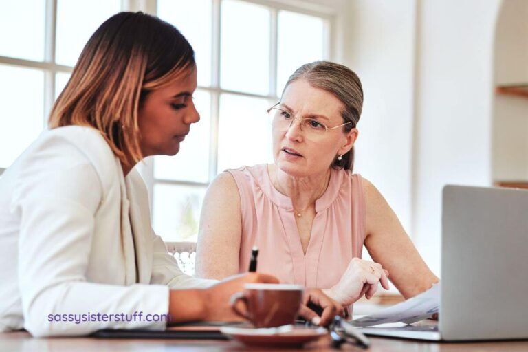two business women working together at a desk