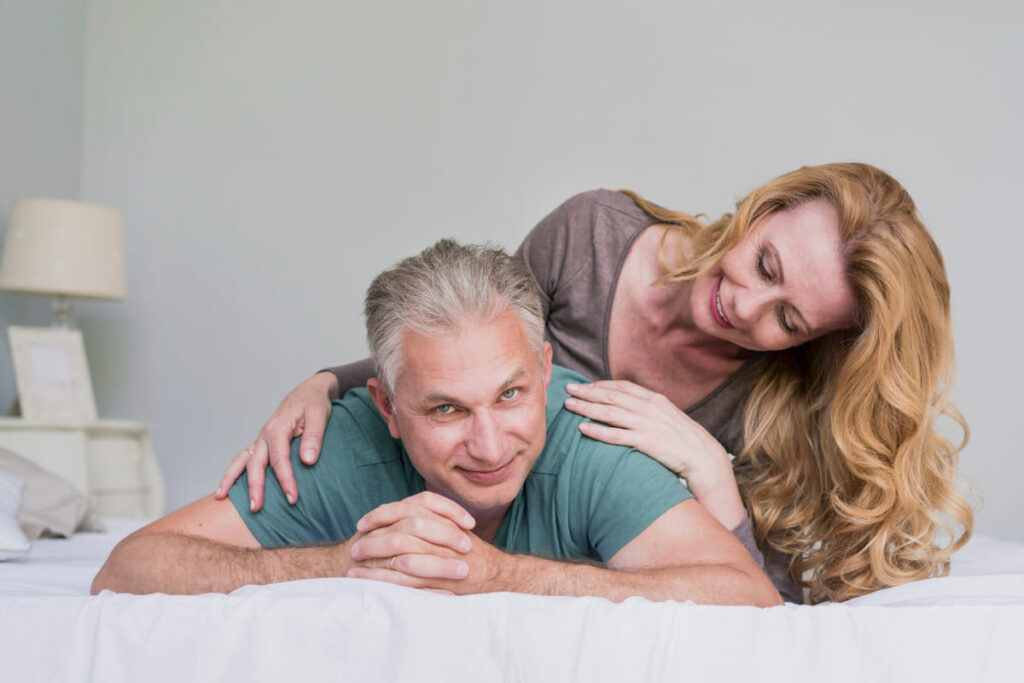 Lovely elderly man and woman playing together
