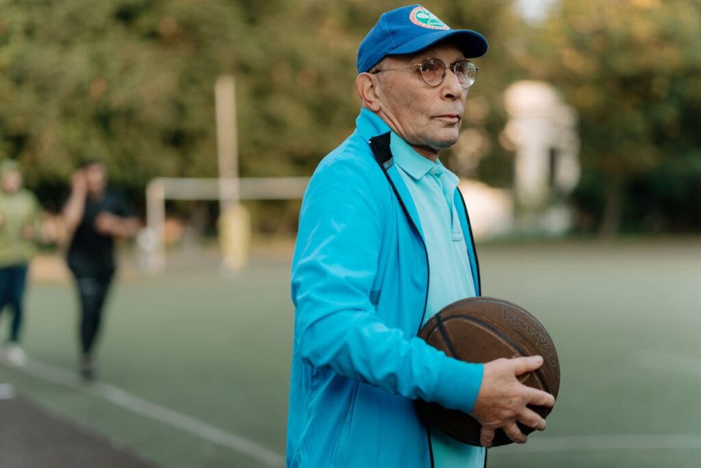 Man Holding a Basketball