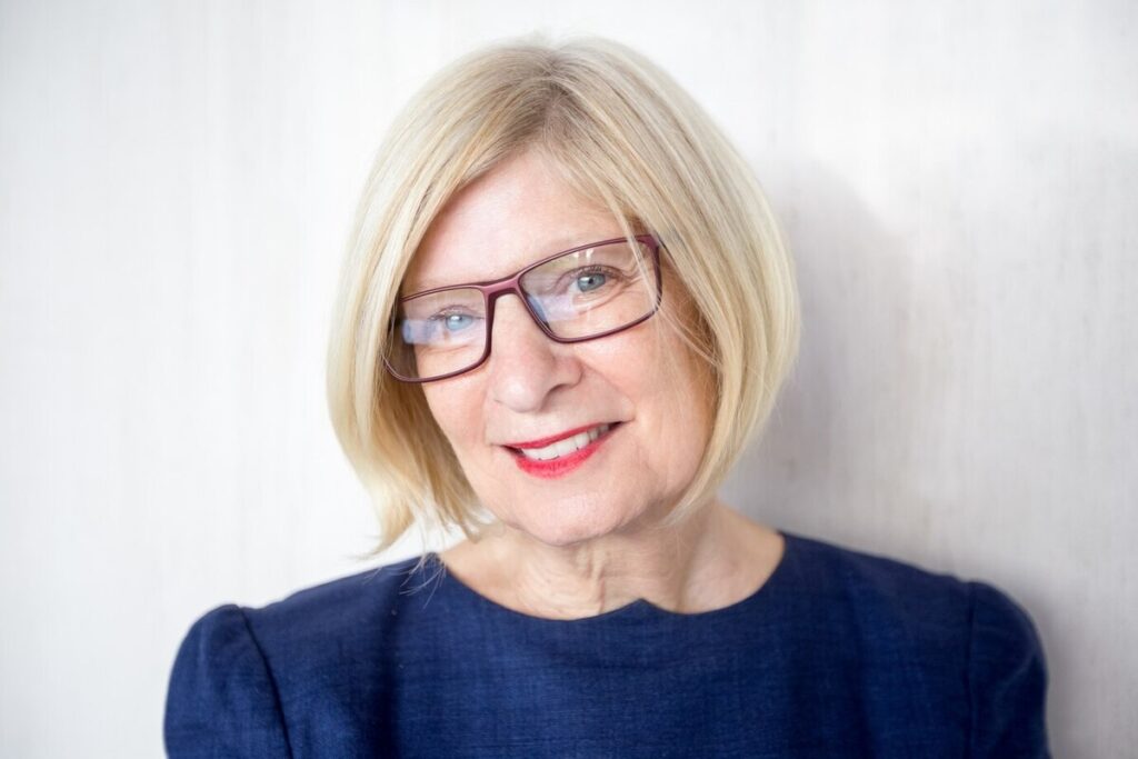 Cheerful senior woman looking at camera