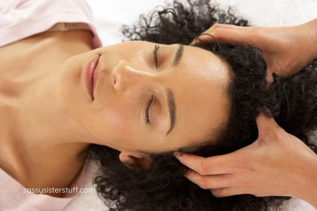 woman getting a scalp massage.