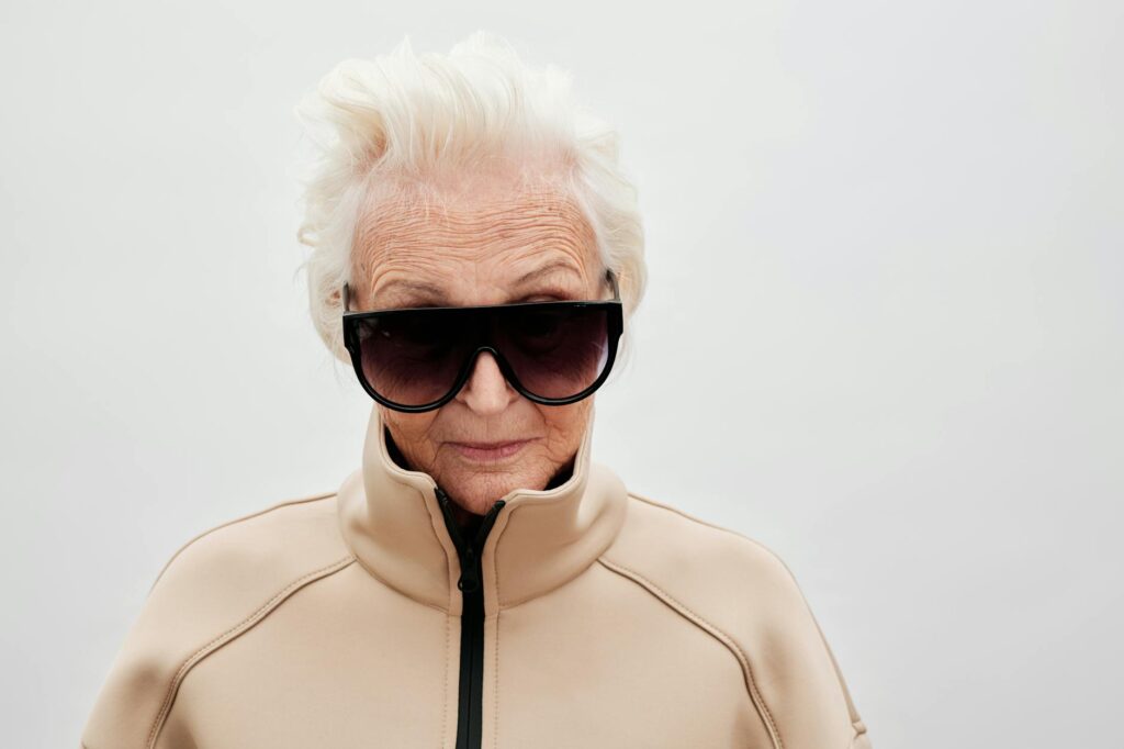 Portrait of a senior woman with sunglasses exuding elegance and style.Moe Magners