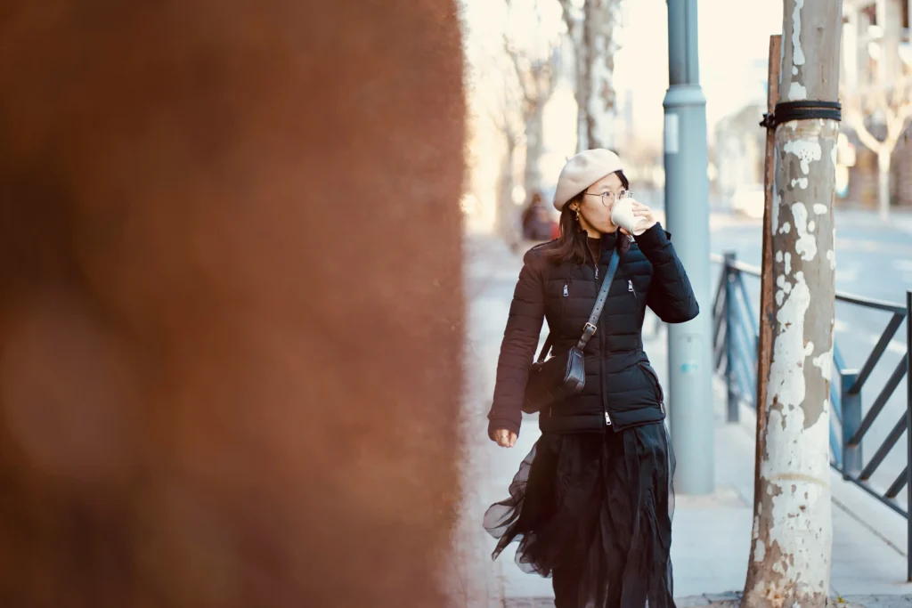 ts, casual elegant outfit, cropped pants or midi skirt, walking in park or urban street,