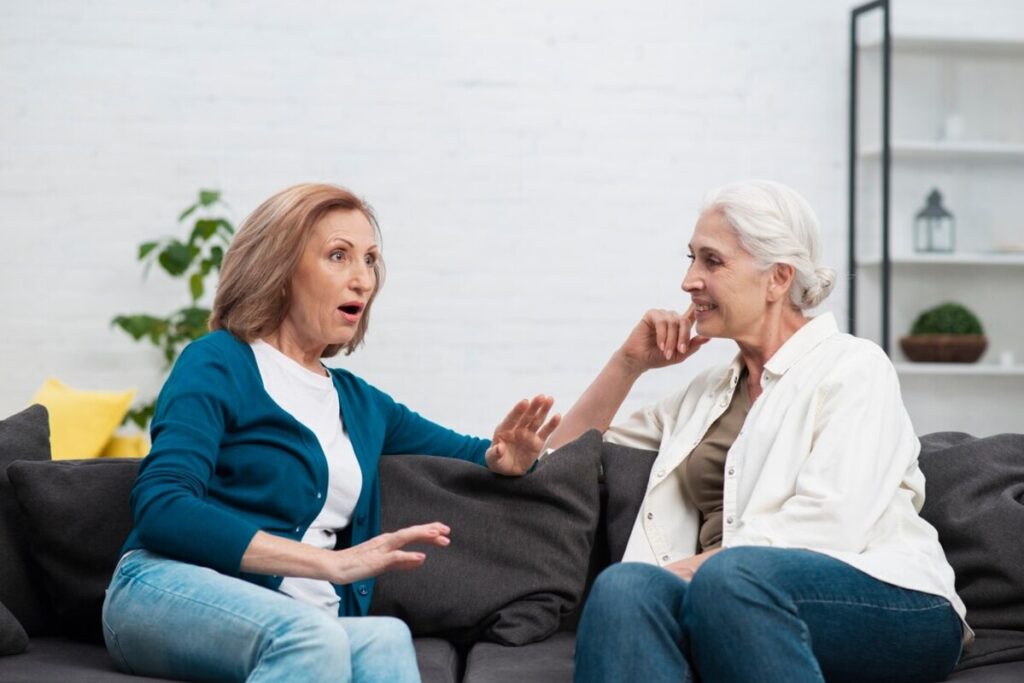 Portrait of women sitting on the couch