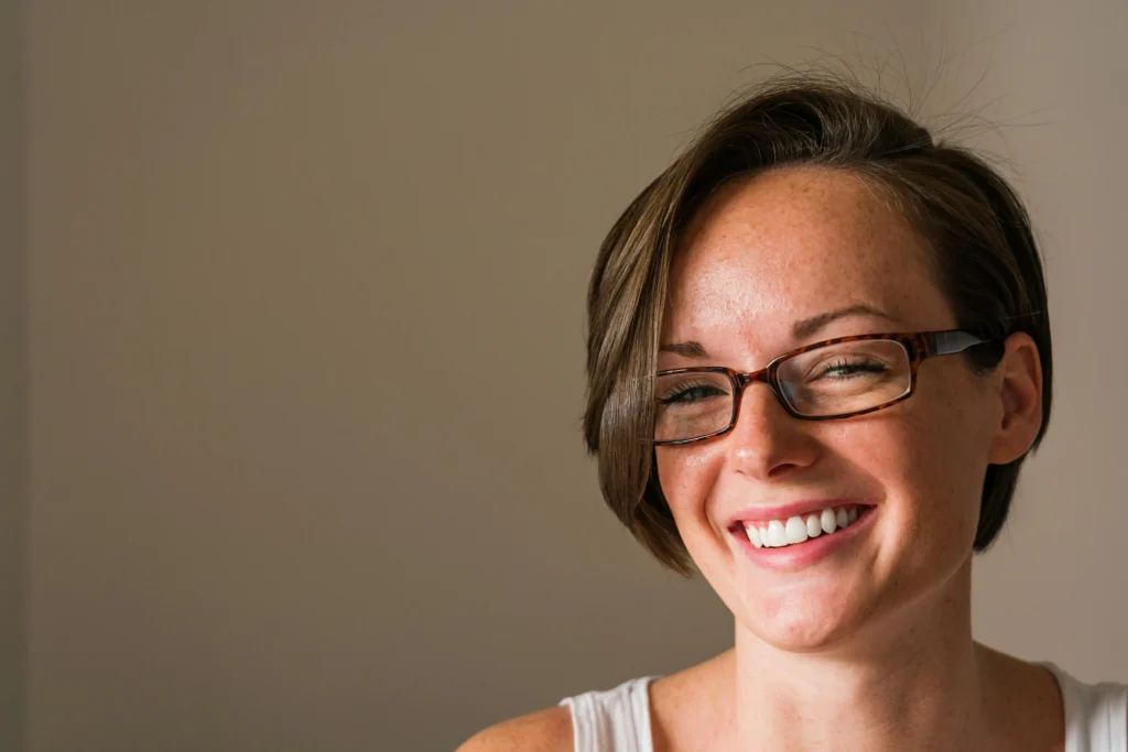 Happy Woman Wearing Eyeglasses