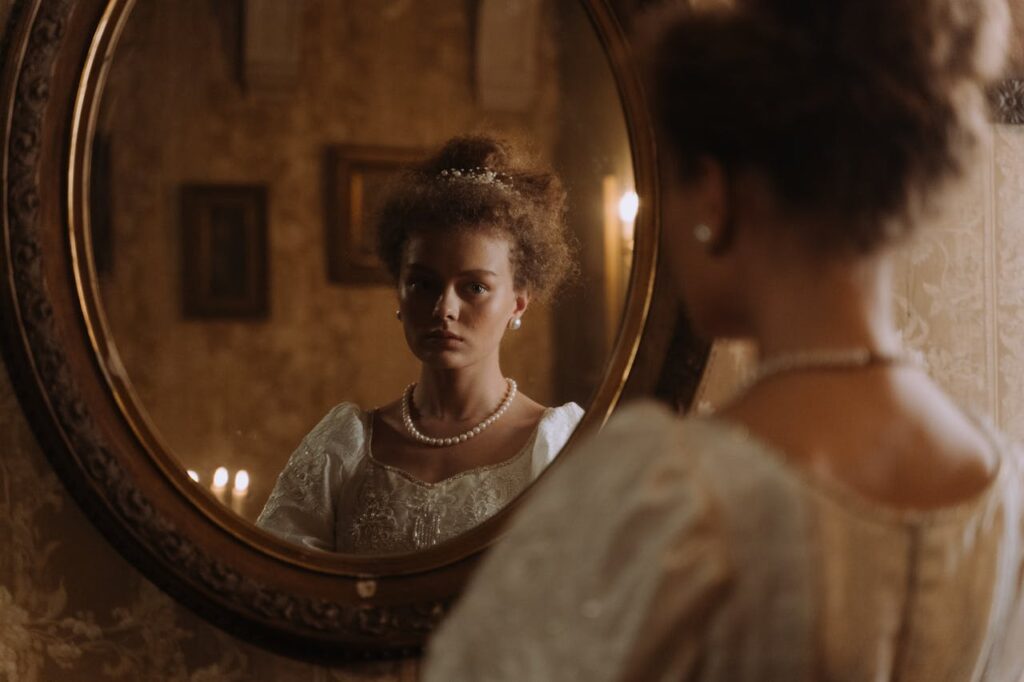 A Woman Looking at the Mirror