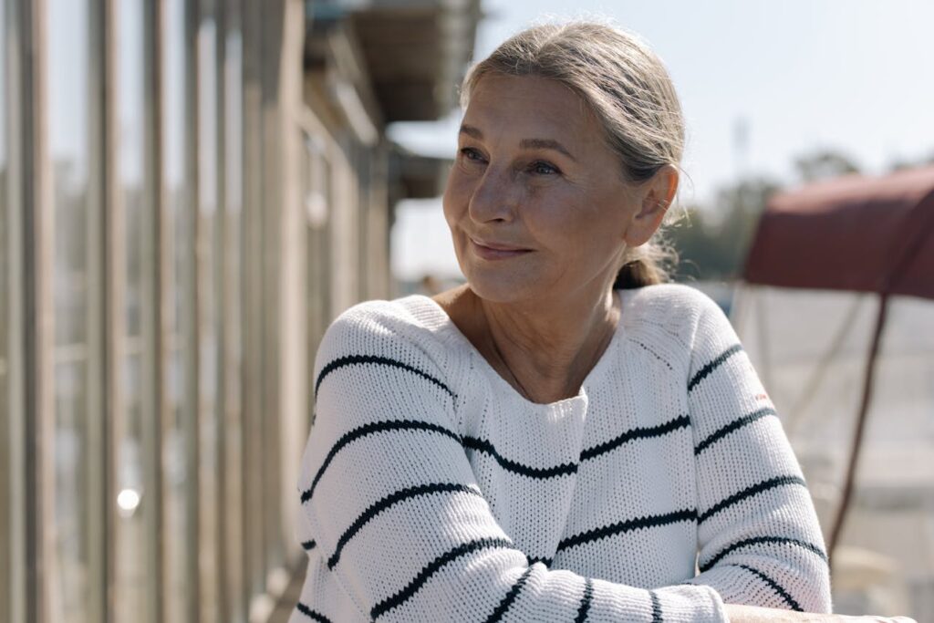 A Woman Wearing a Knitted Sweater
