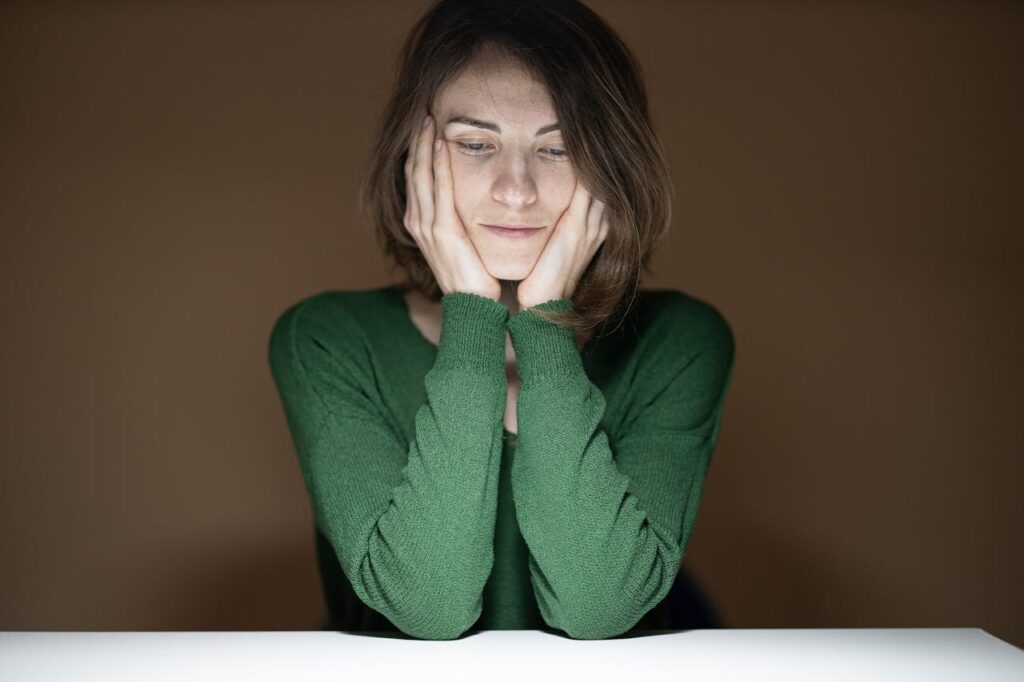Woman Wearing Green Long Sleeved Shirt