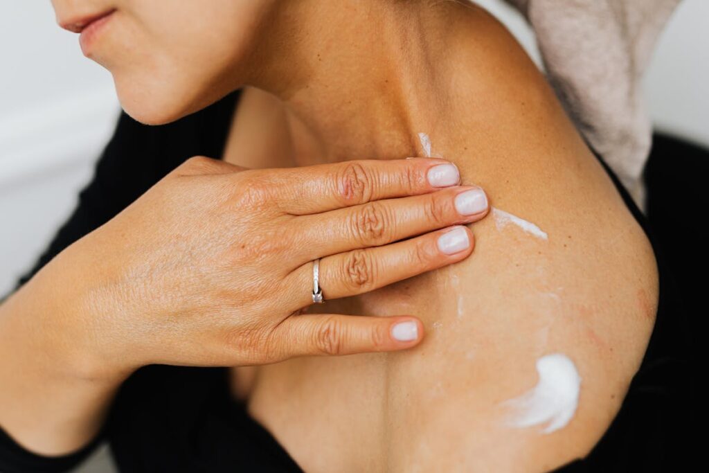 Woman applying wrinkle removing cream