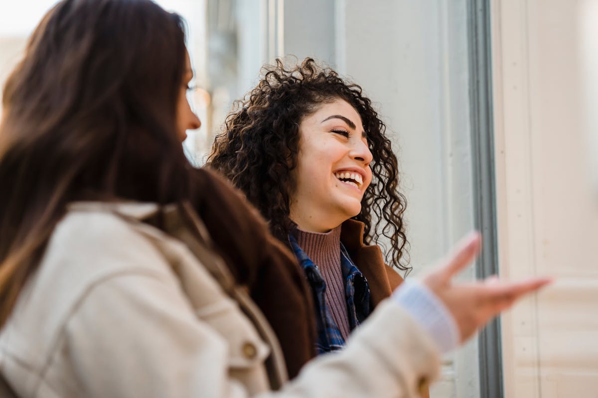 2 Woman laughing together