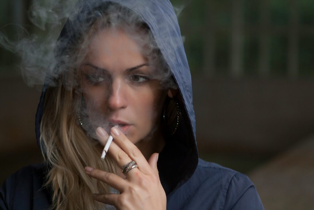 woman refusing cigarette or vape, choosing healthy lifestyle