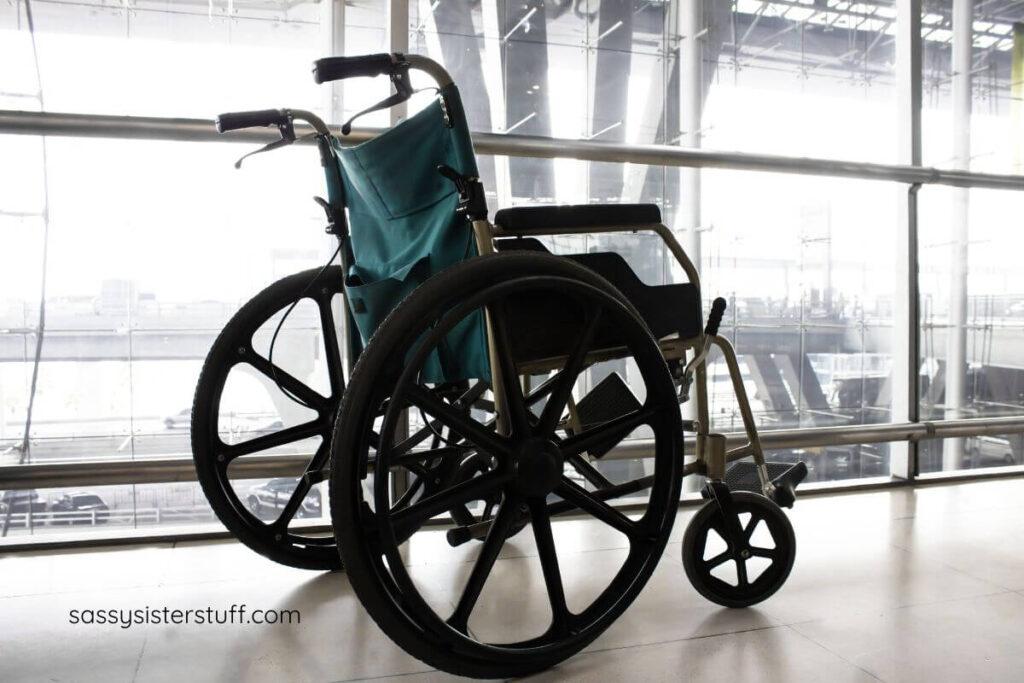 wheelchair sitting in an airport for people who are traveling with chronic pain and need help.