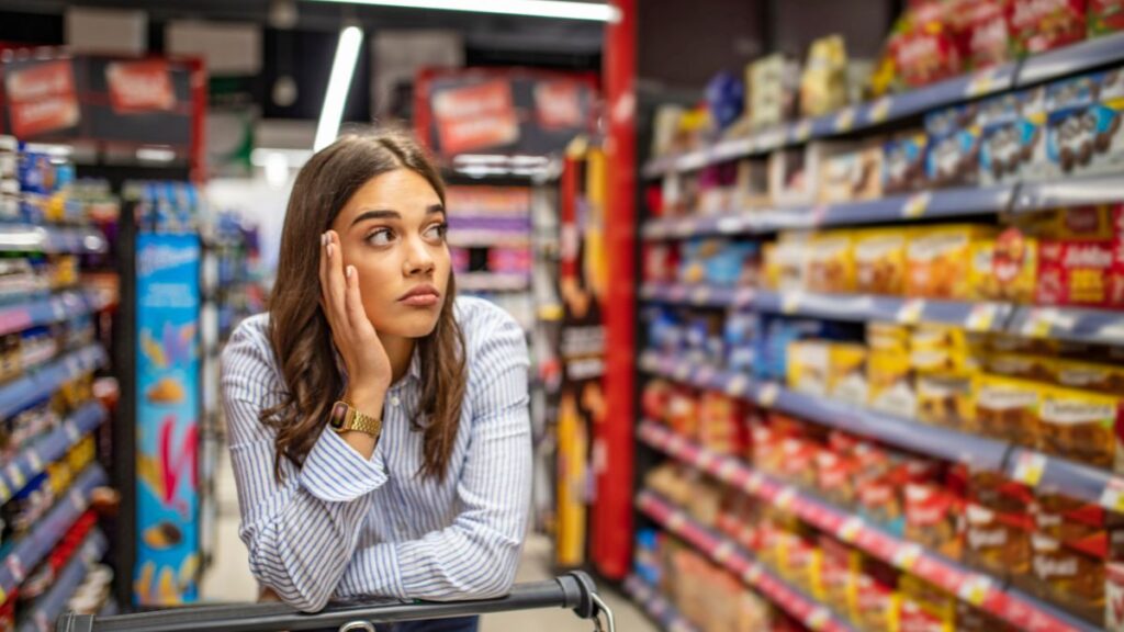 woman confused in grocery store