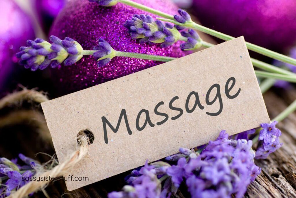 purple flowers with a tag that says Massage.