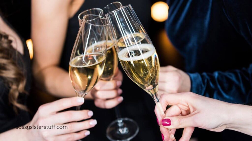 close-up of four women toasting to their successes
