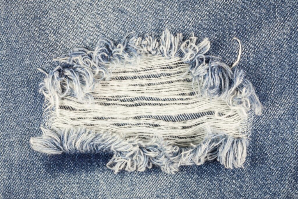 Frayed or ill-fitting jeans