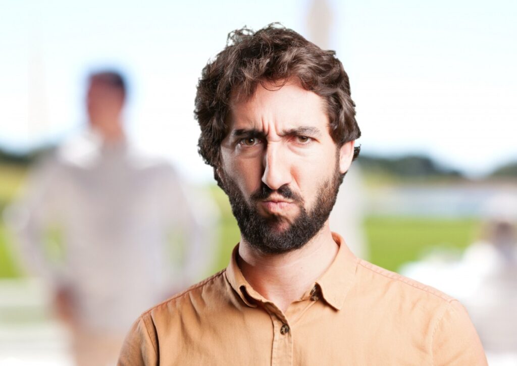 Frequently frowning or squinting