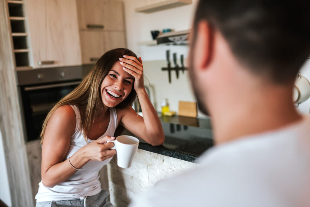 She laughs genuinely at your jokes