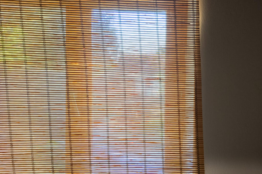 Use bamboo blinds for natural light filtering