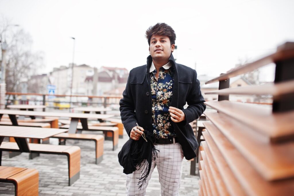 Wearing worn-out or ill-fitting clothes