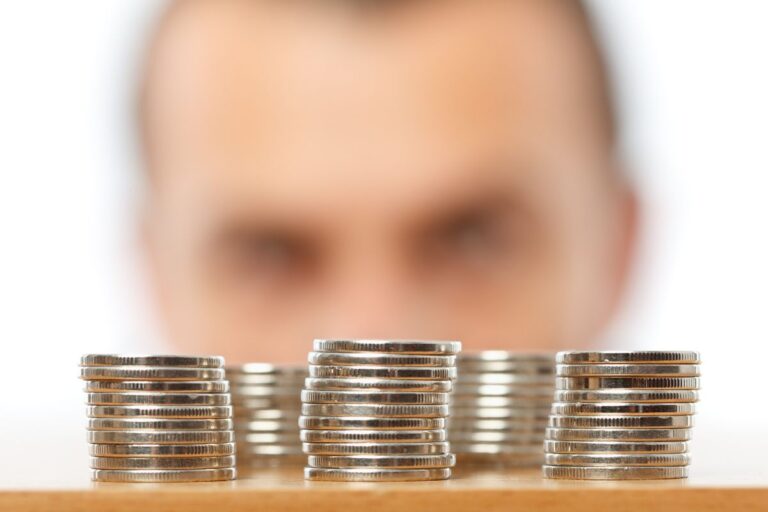 man behind coins