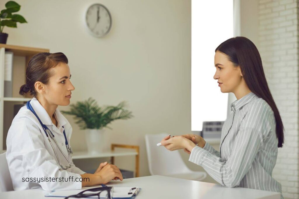 female nursing student asks a female nurse for help.