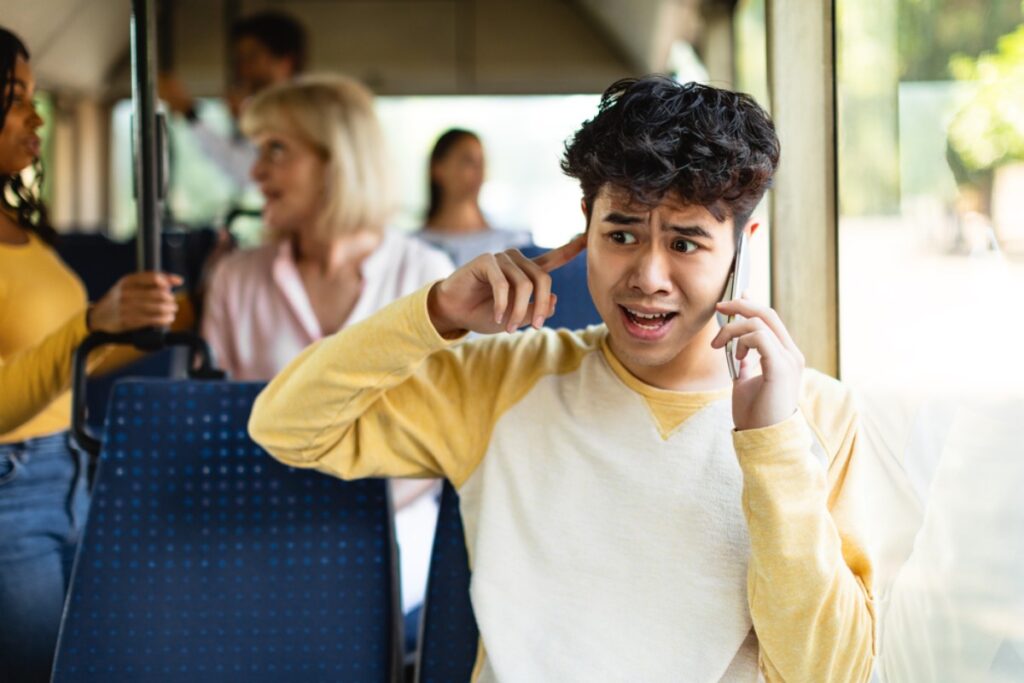 Answering calls loudly in public